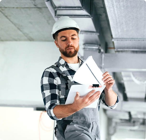 Technician reviewing project plans with a homeowner